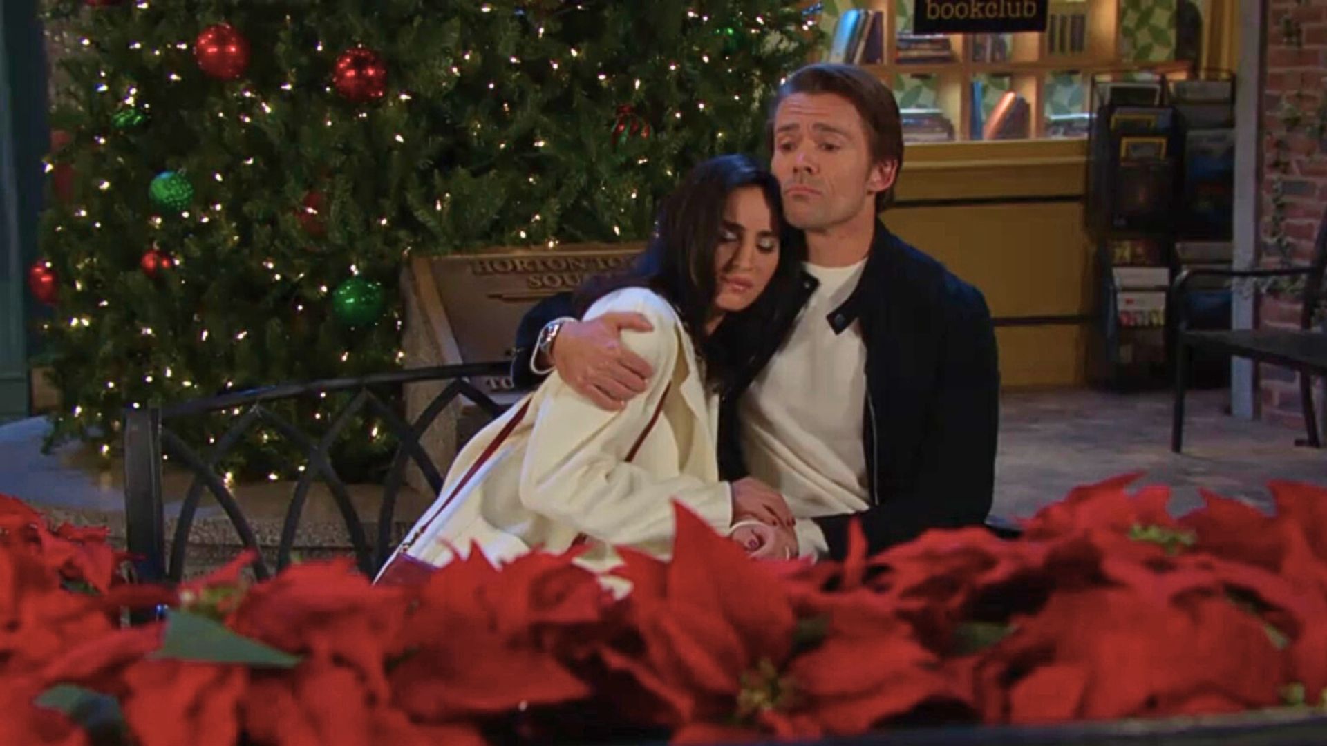 Philip hugs Gabi on a park bench on Days of our Lives recap
