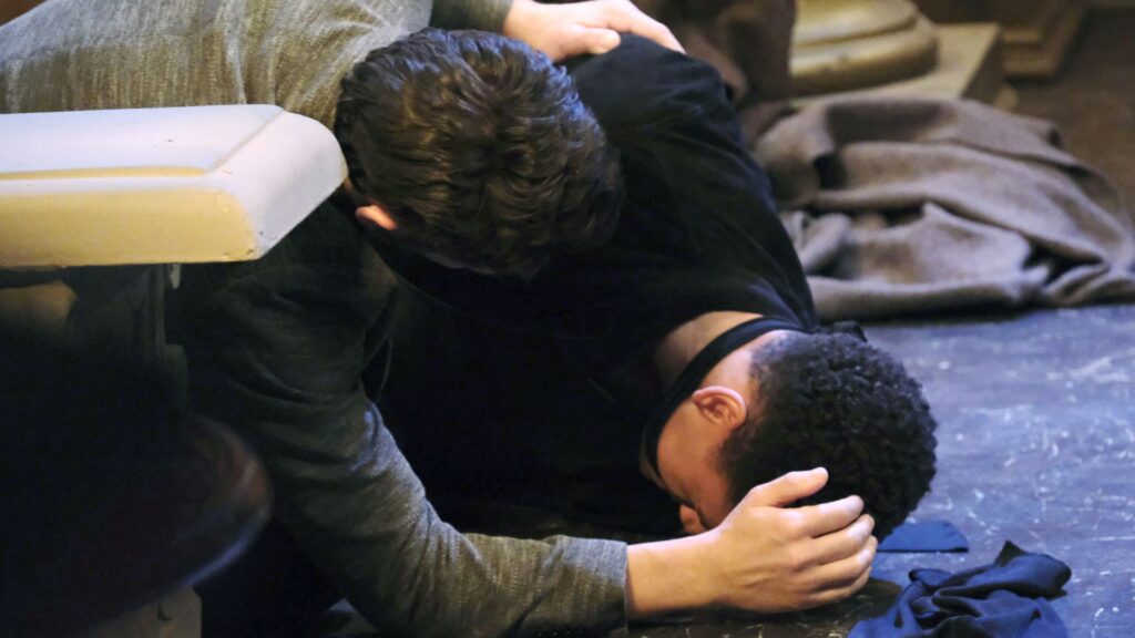 Chad finds Theo on the floor of the crypt on Days of our Lives