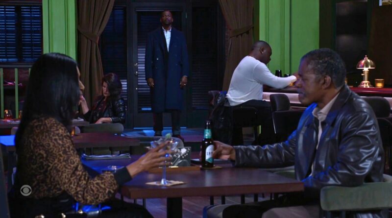 Ted walks into Uptown and sees Leslie and Marcel sitting and talking on Beyond the Gates