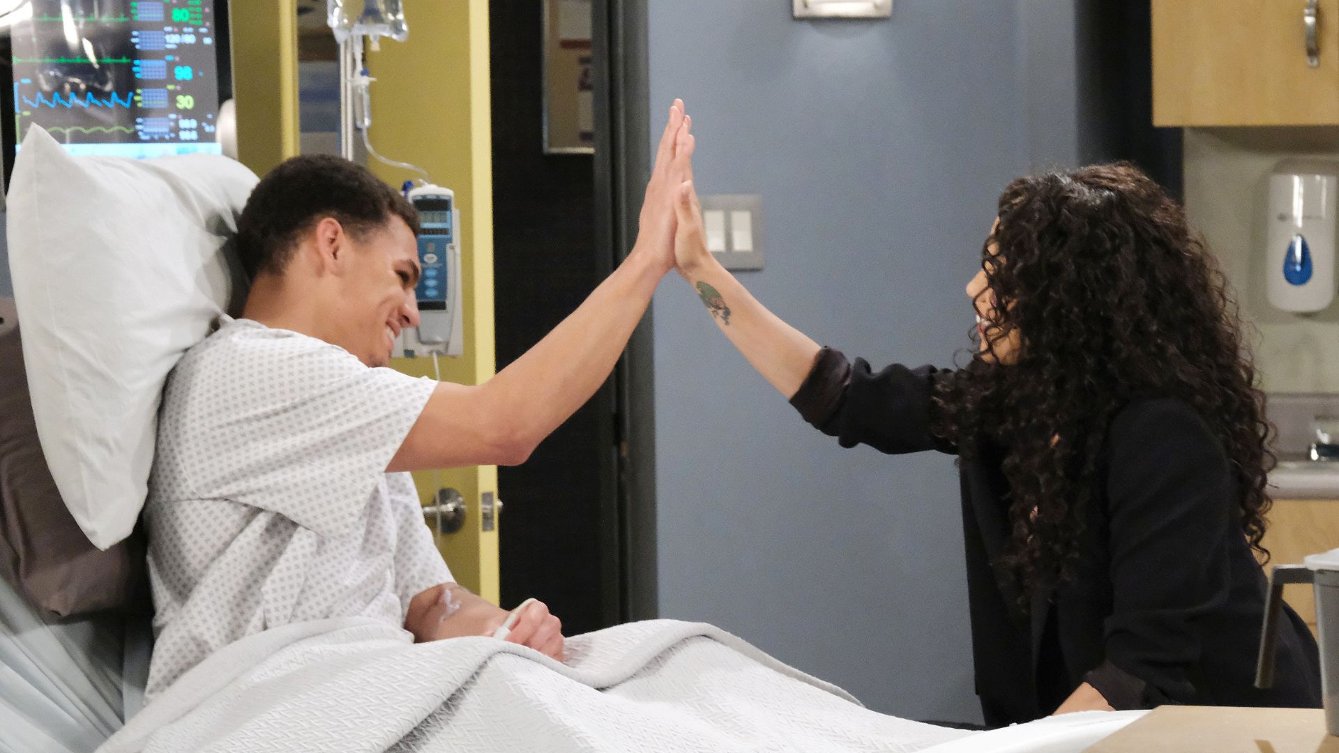 Theo and Jada high five in the hospital on Days of our Lives spoilers
