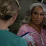 Cast members of Beyond the Gates in a dramatic scene, highlighting the show's focus on Black families and community health awareness.